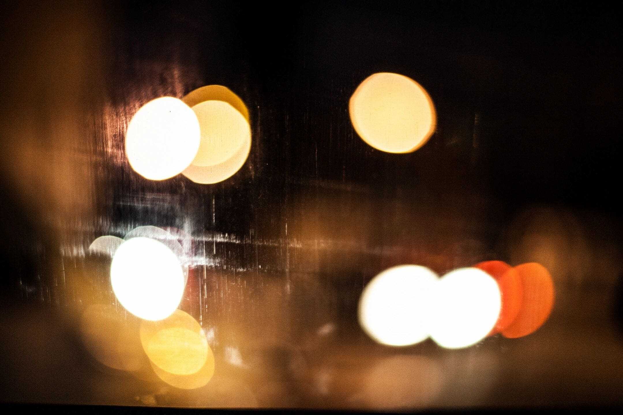 Atmospheric bokeh lights creating intimate ambiance in a Tokyo Jazz Kissa bar